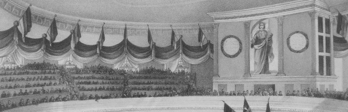 Gemälde der Frankfurter Nationalversammlung in der Paulskirche 1848; voller Saal mit Menschen und Blick auf das Rednerpult